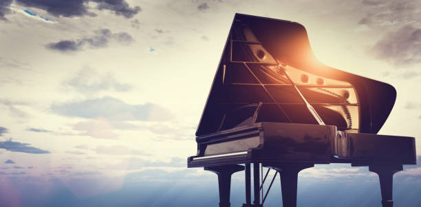 istock Grand piano on sunset sky background 1340663879