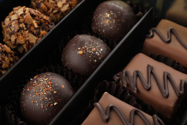 istock Many different chocolate candies in box, closeup 1340663997