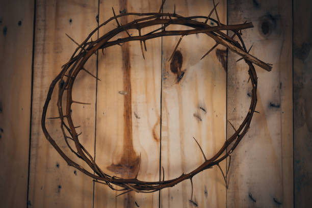 istock Crown on thorns on wooden background. 1340667290