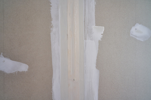 laminated plasterboard join tape plastering DIY detail