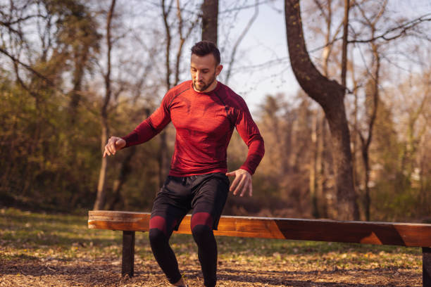 istock Man working out outdoors on sunny autumn day 1340672514