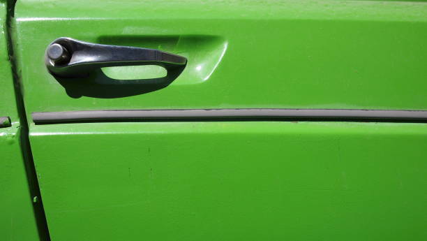 istock Front door of retro car close-up 1340672647