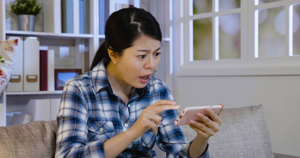 istock girl unsatisfied with bad connection on internet 1340672802