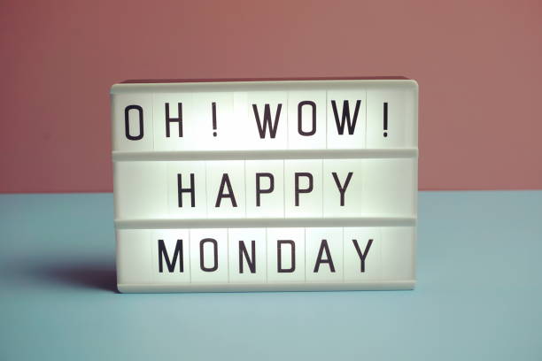 istock Happy Monday word in light box on blue and pink background 1340673813