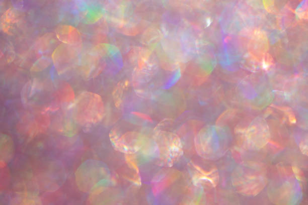 istock Abstract defocused pink background with shining glitter.Good as overlay layer. 1340674384
