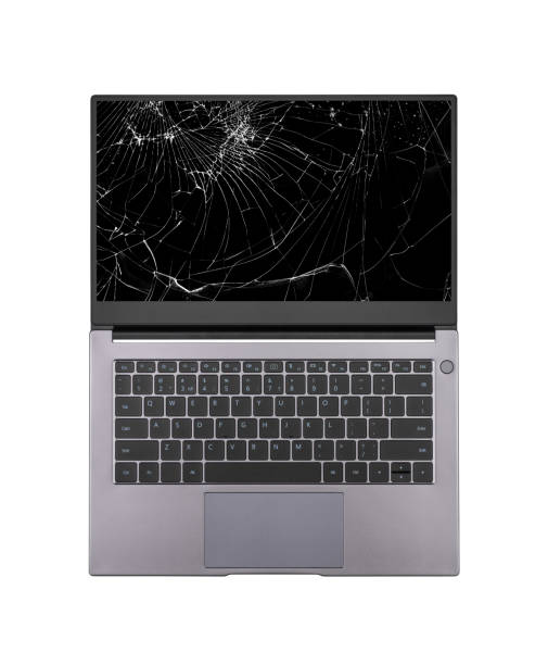 istock open laptop with a broken, cracked screen isolated on white background close up top view 1340676753