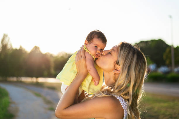 istock Mother and newborn baby on sunset 1340677043
