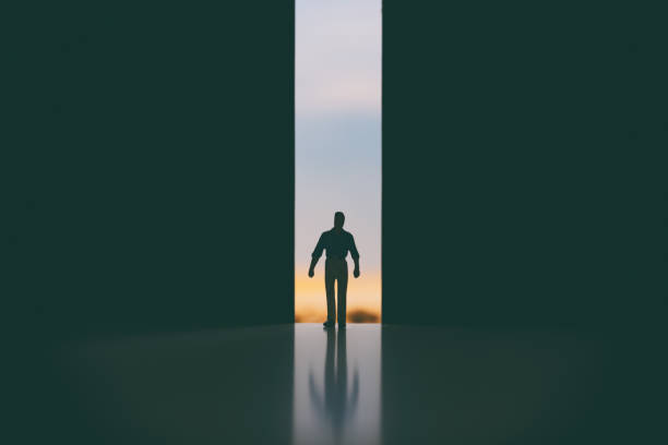 istock Walking Through The Doorway Into Darkness 1340679651
