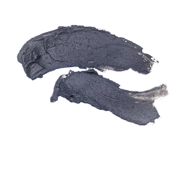 istock black volcanic cosmetic clay texture isolated on white background, cosmetic clay solution for advertising of skin care product 1340679938