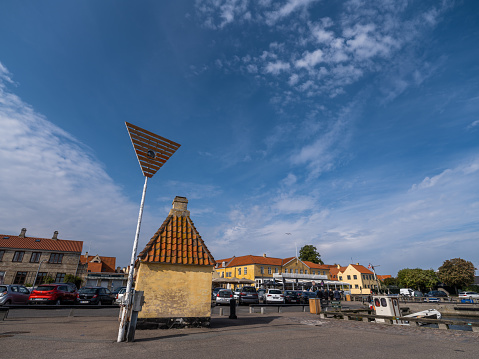 The old harbour in Dragør, Denmark.\nDragør on south Amager, the island south of Copenhagen, used to be a small fishing village. Today it is a wealthy residential village.