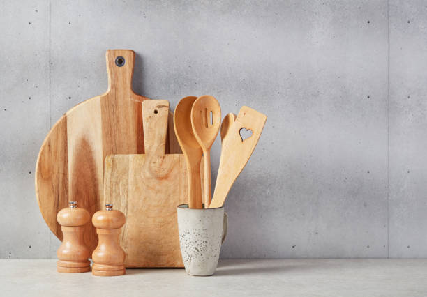 istock Wooden cutting boards, spoons, salt and pepper 1340682484