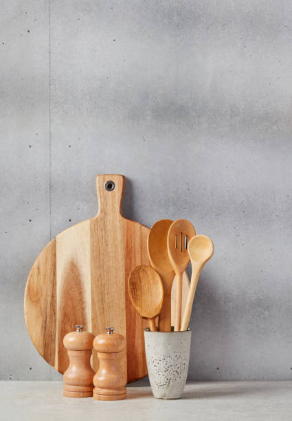 istock Cutting board, spoons, salt and pepper 1340682489