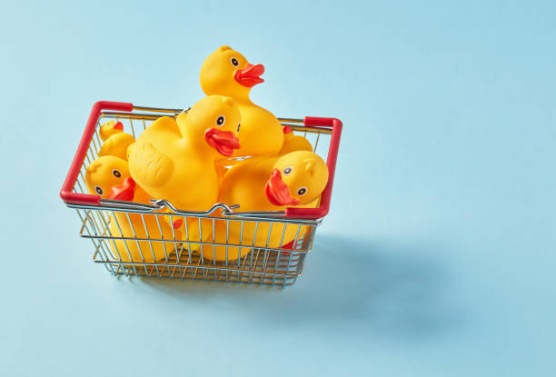 istock Shopping basket full with rubber ducks 1340682529