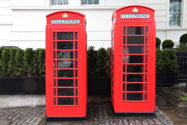 istock London UK - red telephone booths 1340685280