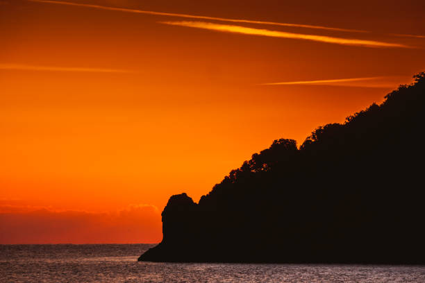 istock Sunrise or sunset over sea surface 1340686099