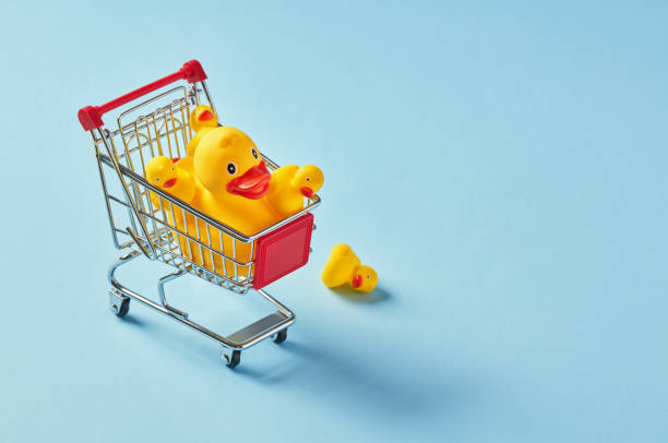 istock Shopping cart full with rubber ducks 1340688066