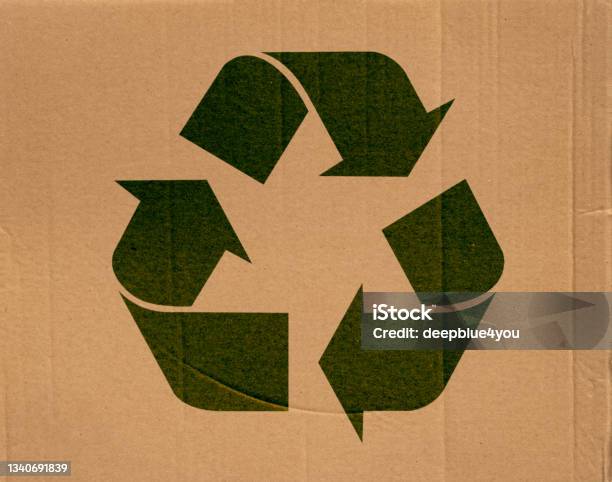 Cardboard With Recycling Symbol Stock Photo - Download Image Now - Circular Economy, Recycling, Paperboard