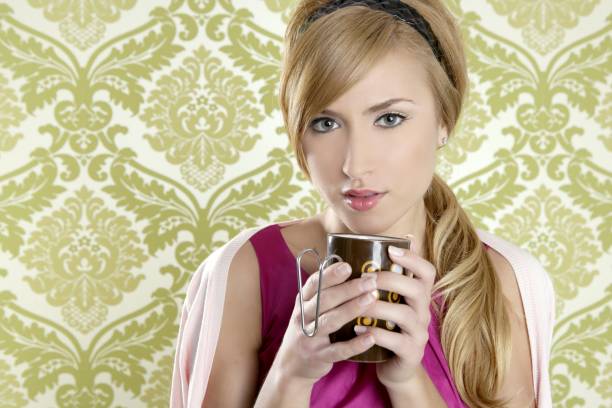 istock coffee retro woman vintage cup portrait 1340692090