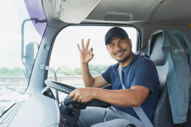 Photo of man truck driver happy smiling proud confident