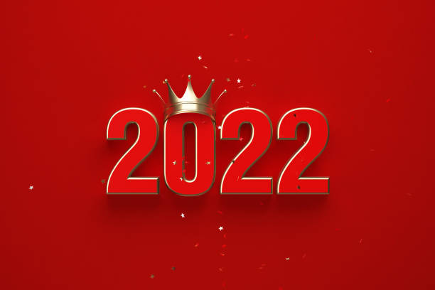istock Year 2022 Wearing Gold Crown Over Red Background 1340693399