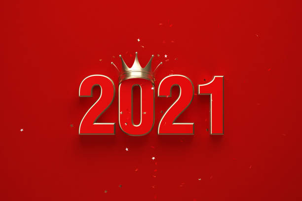 istock Year 2021 Wearing Gold Crown Over Red Background 1340693433