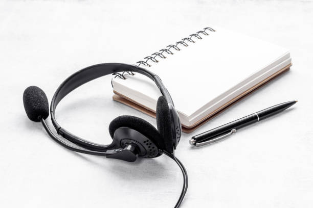 istock Hotline or call center support equipment. Headset equipment 1340694518