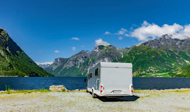 istock Motorhome standing on a fjord in Norway 1340698375