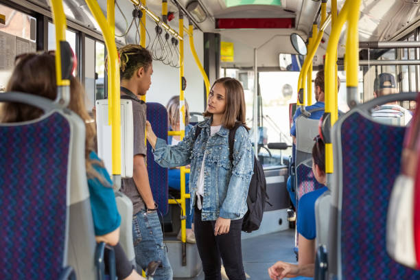istock Multi-ethnic friends traveling in bus 1340698617