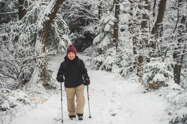 istock Young woman hiking in winter scenery 1340699668