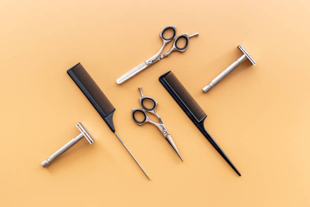 istock Barber tools with hairdressing scissors and combs 1340699978