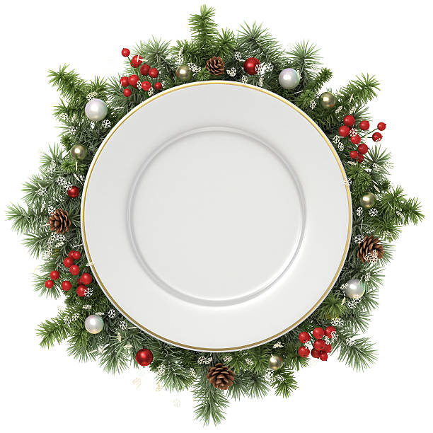 Plate in a Christmas wreath. stock photo