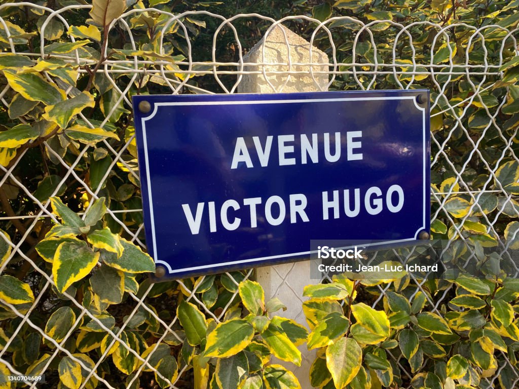 Avenue Victor Hugo street sign Avenue Victor Hugo street sign in France Street Name Sign Stock Photo