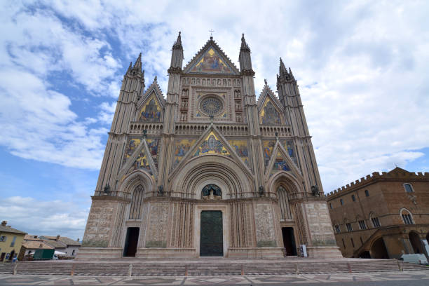 Orvieto Cathedral facade, a large 14th-century Roman Catholic cathedral in the town of Orvieto in Umbria, central Italy.