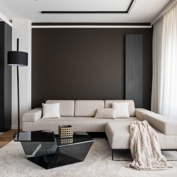 istock Big, corner sofa in elegant living room 1340705145