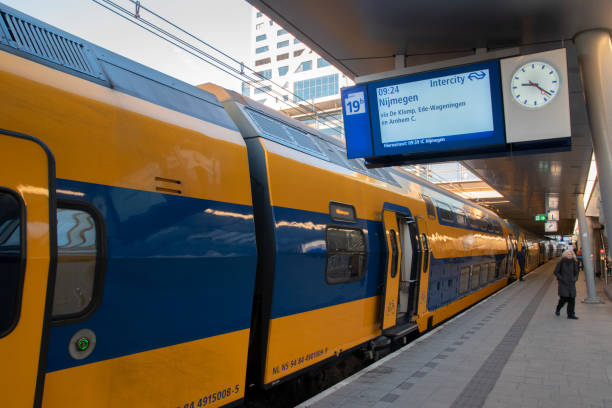 ns intercity train at the central station at utrecht the netherlands - trein nederland stockfoto's en -beelden