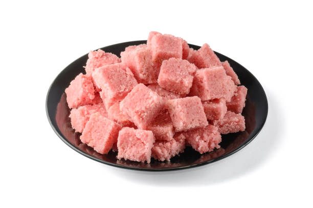 istock plate full of coconut toffees or coconut sweets isolated on white 1340705279