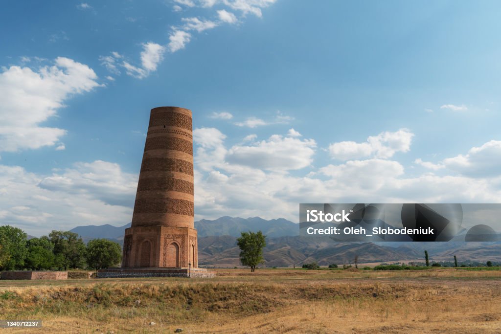 Burana tower in Kyrygzstan Scenic view of  Burana tower in Kyrygzstan Ancient Stock Photo