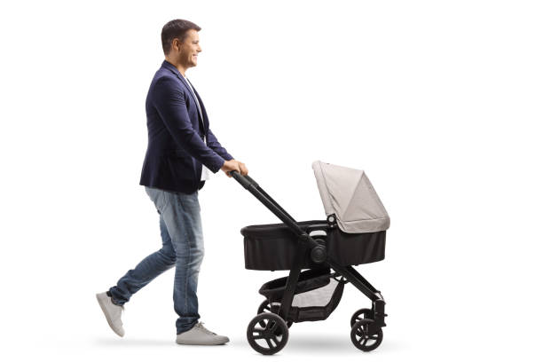 istock Full length profile shot of a happy father pushing a stroller 1340712668