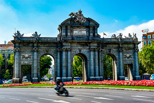 Puerta de Alcalá , Madrid, Spain is one of five royal gates that gave access to the city of Madrid.  The gate was inaugurated in 1778 by the Italian architect Francesco Sabatini, who spent most of his life working in Madrid for the Spanish.