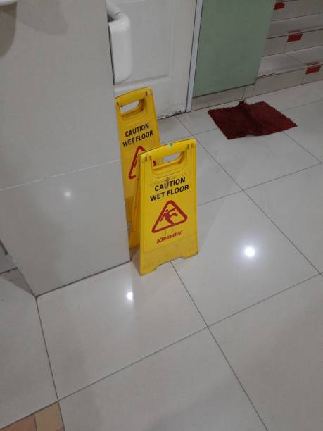 istock The sign of wet floor 1340719613