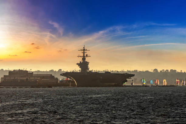 Nuclear aircraft carrier in San Diego Modern nuclear aircraft carrier in San Diego, California, USA us navy stock pictures, royalty-free photos & images