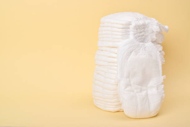 istock A large stack of disposable panties on a yellow background. 1340722334