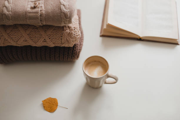 istock cozy comfortable autumn home atmosphere and still life with a cup and sweaters 1340723356