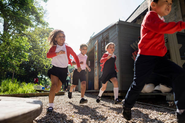 istock Racing To The Schoolyard Together 1340726284