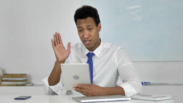 afro-american businessman discussing project during online video chat - 18797 imagens e fotografias de stock