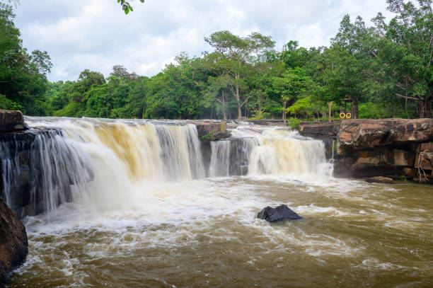 istock Beautiful waterfall stream at Tatton National Park, Thailand 1340730486