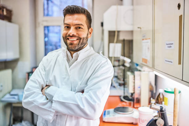 istock Confident scientist in lab coat at research center 1340730727