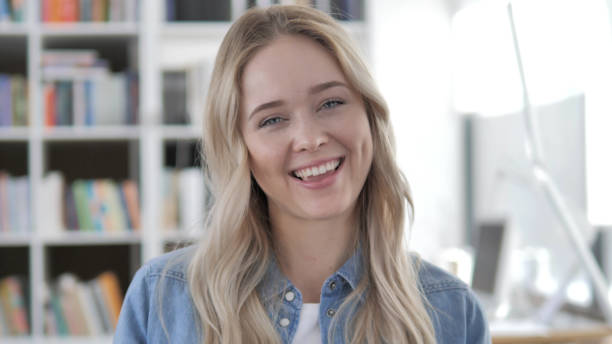 istock Young Blonde Woman Talking During Video Chat 1340731018