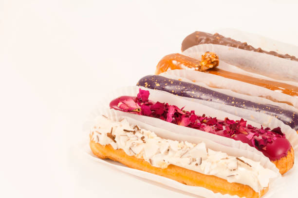 Eclair with coconut , roses and others