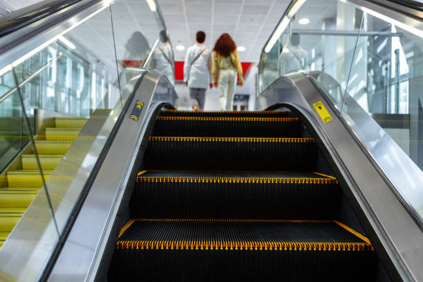 istock Escalator stairs close up in a shopping mall 1340732444
